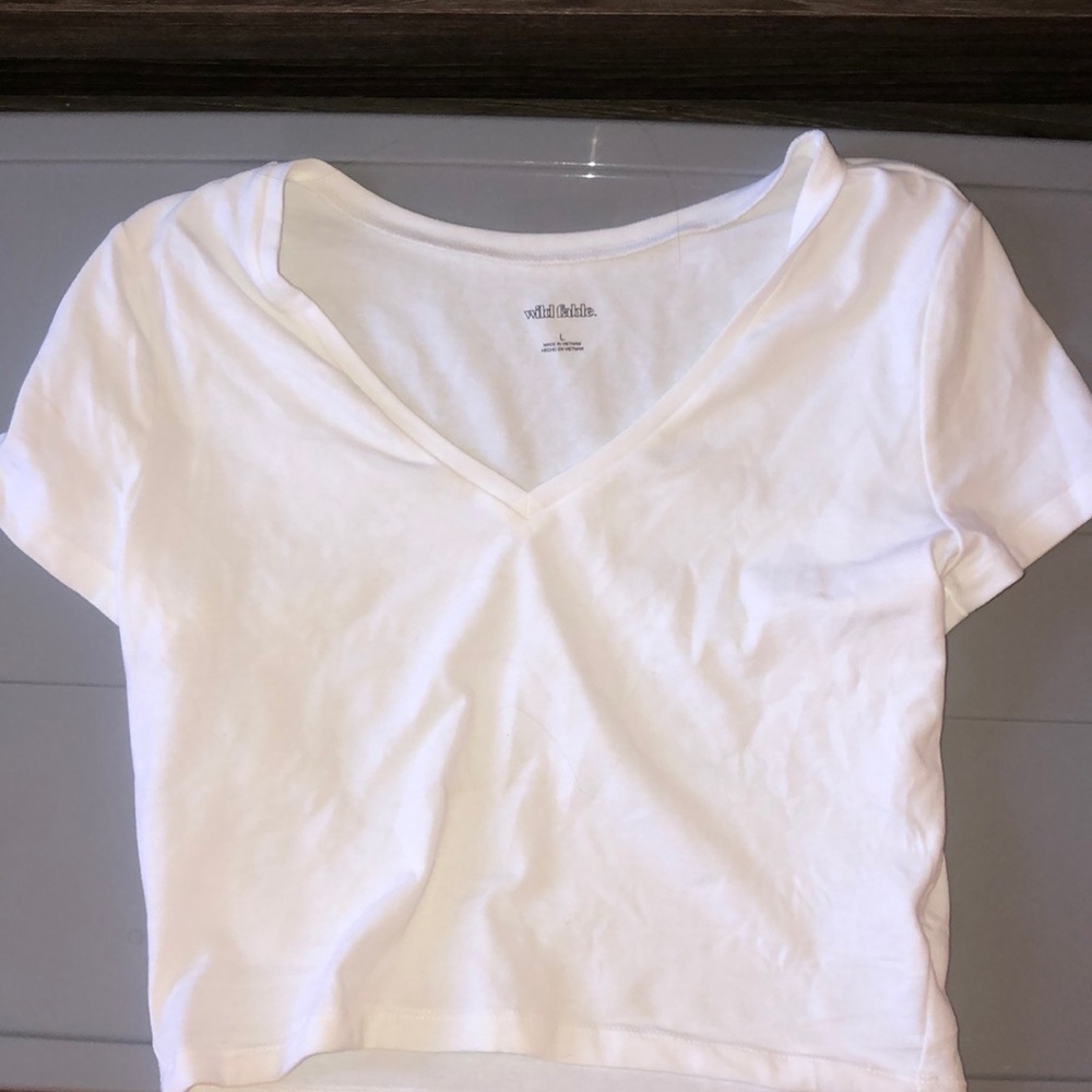 A large wild fable white crop top.